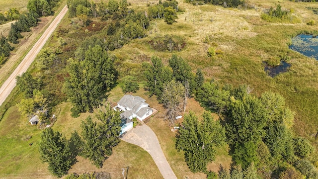 birds eye view of property featuring a rural view