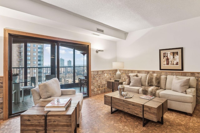 living room featuring a textured ceiling