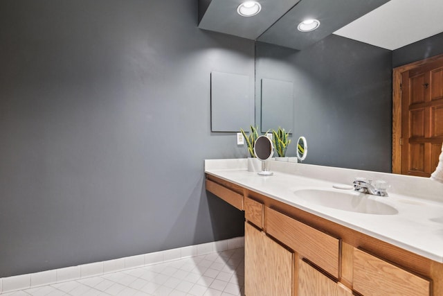 bathroom featuring tile patterned floors and vanity