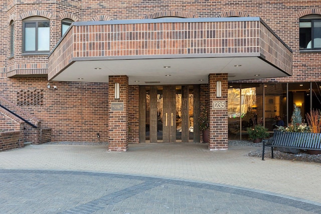 doorway to property featuring a balcony