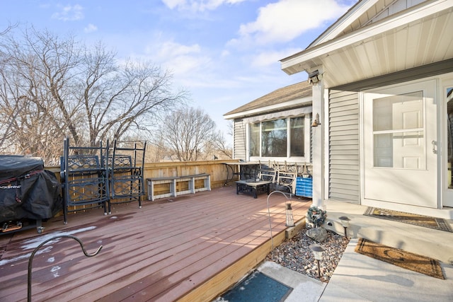 wooden deck with grilling area