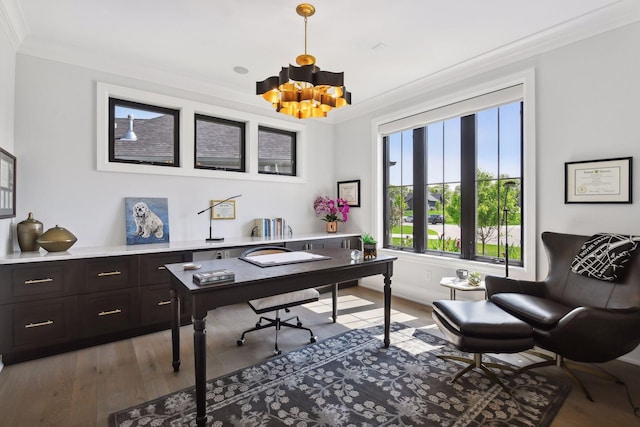 office area featuring an inviting chandelier, crown molding, and dark hardwood / wood-style flooring