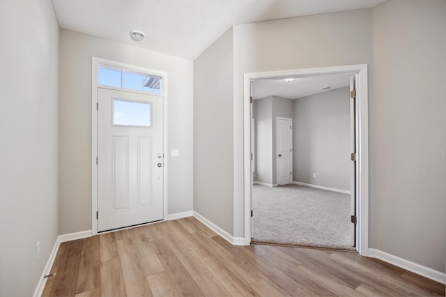 foyer with light hardwood / wood-style flooring