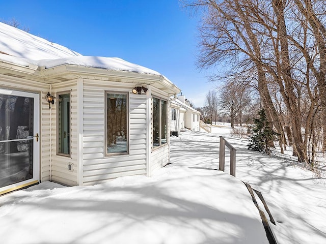 view of snow covered property