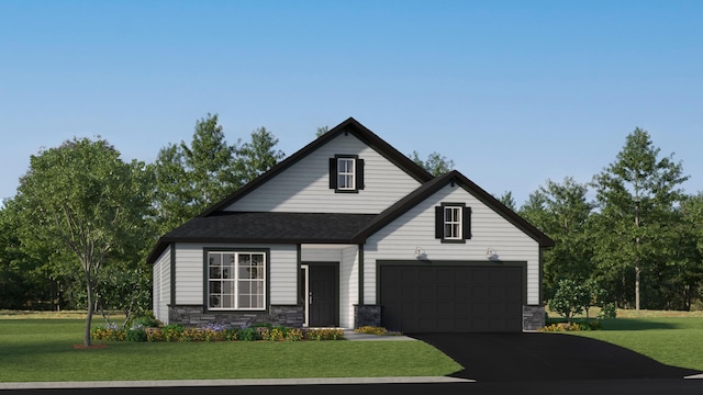 view of front of house featuring a garage and a front lawn