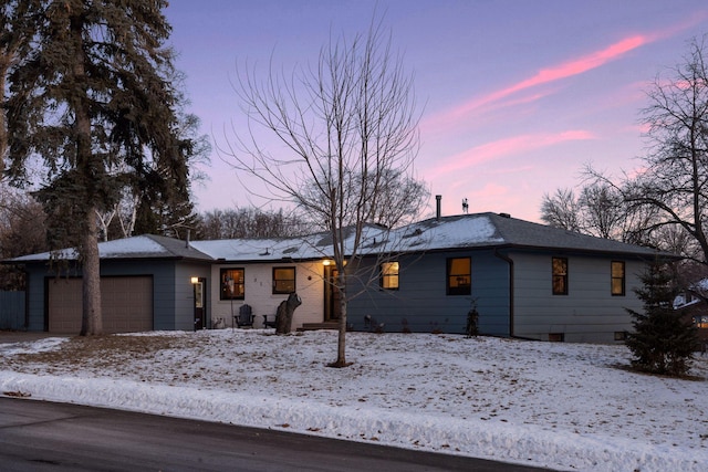 ranch-style house with a garage