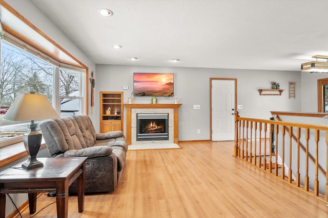 living room with light hardwood / wood-style flooring