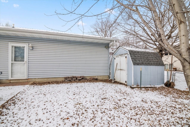 view of snow covered garage