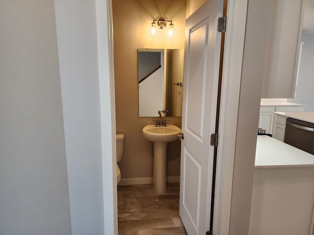 bathroom featuring toilet