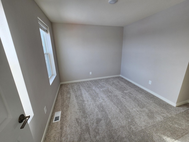 view of carpeted spare room