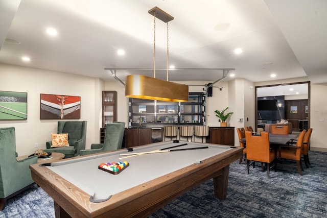 game room featuring pool table and dark colored carpet