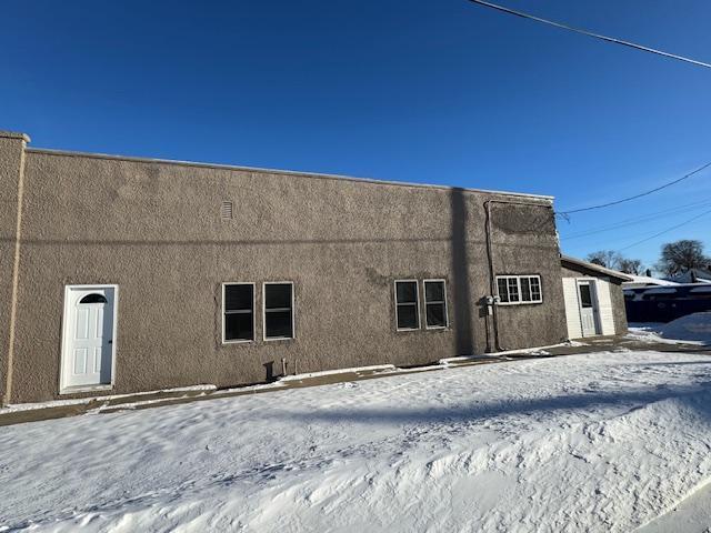 view of snow covered property