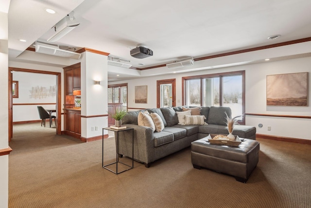 carpeted living room with crown molding