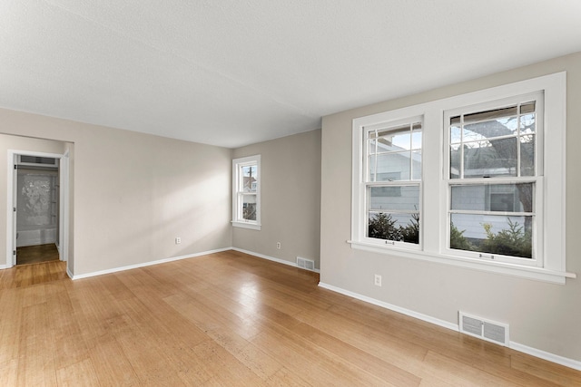 empty room featuring light hardwood / wood-style floors