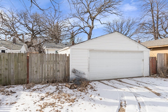 view of snow covered garage