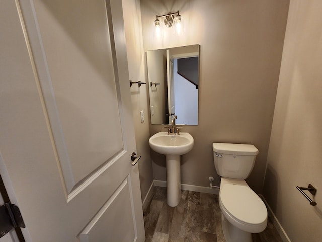 bathroom featuring sink and toilet