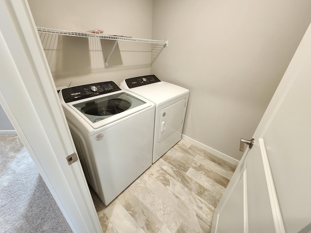 laundry room with washer and dryer