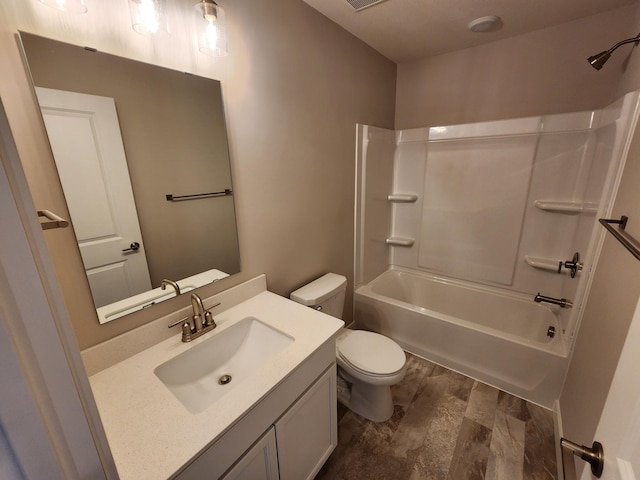 full bathroom featuring vanity, shower / bathtub combination, and toilet