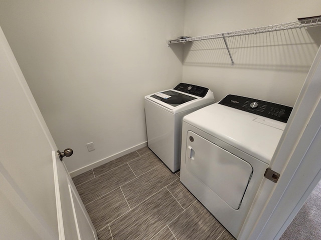 laundry room featuring separate washer and dryer