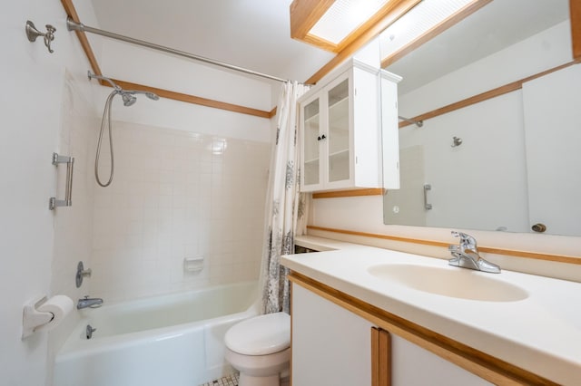 full bathroom featuring toilet, vanity, and shower / bathtub combination with curtain