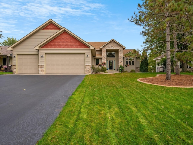 craftsman-style home with a garage and a front lawn