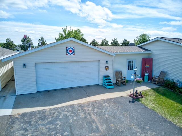 single story home with a garage