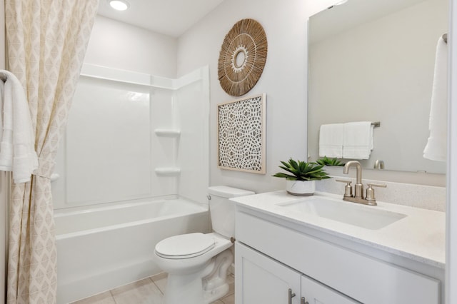 full bathroom with vanity, tile patterned floors, toilet, and shower / bath combo with shower curtain