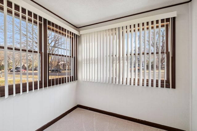 unfurnished sunroom with a healthy amount of sunlight