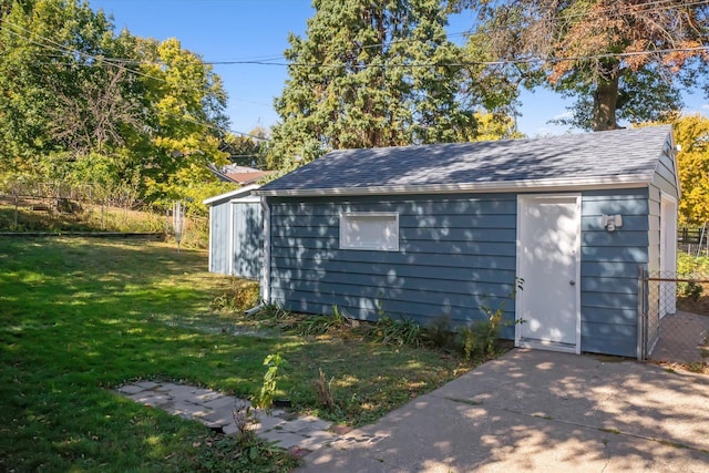 view of outdoor structure with a yard