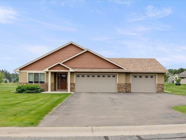 15104 Wild Ave, Brainerd, MN 56401 - craftsman house featuring a garage, a front lawn, stone siding, and driveway