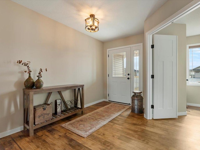15104 Wild Ave, Brainerd, MN 56401 - foyer entrance featuring wood finished floors and a chandelier