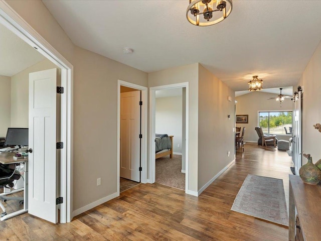 15104 Wild Ave, Brainerd, MN 56401 - hall with a chandelier, wood finished floors, and a desk