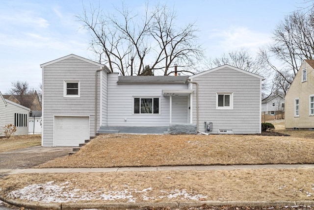 view of front of home with a garage