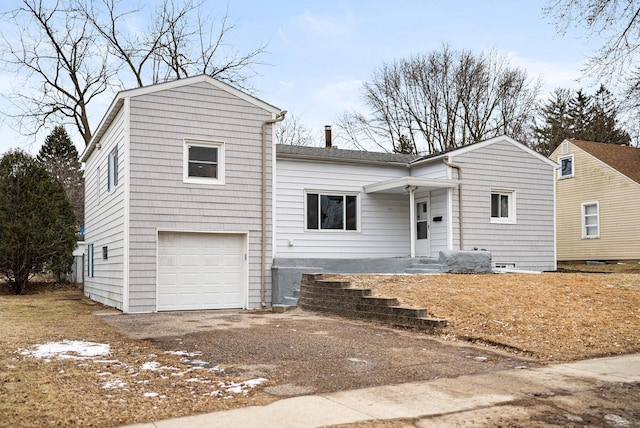 view of front of home with a garage