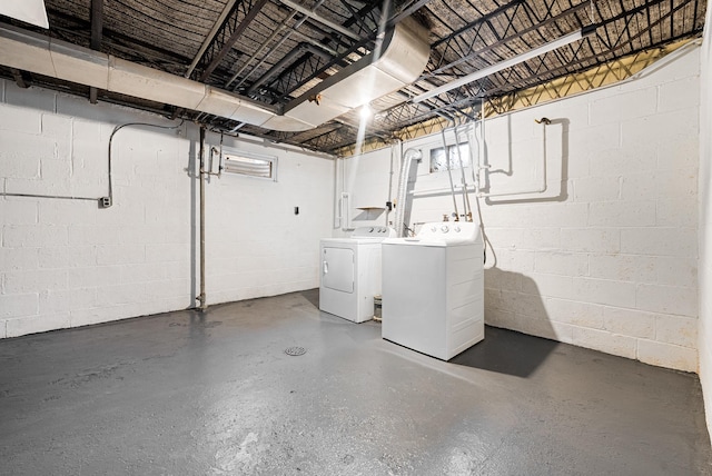 basement with washer and clothes dryer