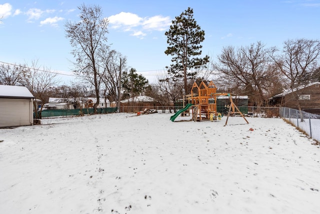 view of snow covered playground