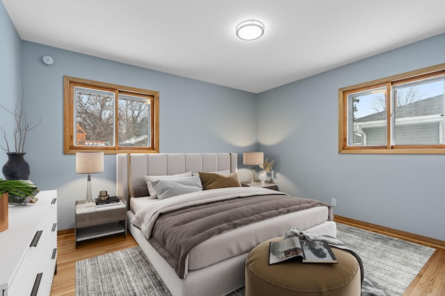 bedroom with light wood-type flooring