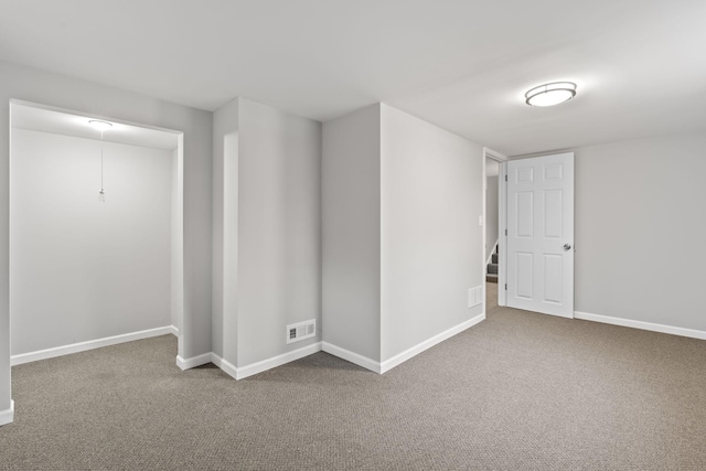 empty room featuring carpet floors