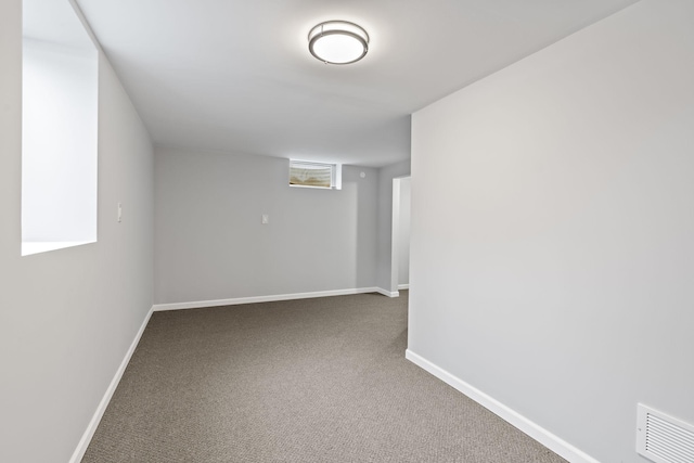 basement with carpet flooring