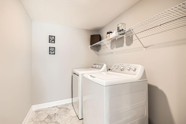 laundry area featuring independent washer and dryer