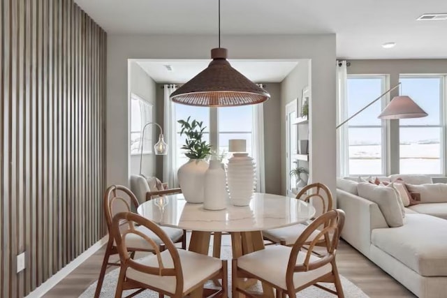 dining room with light wood-type flooring