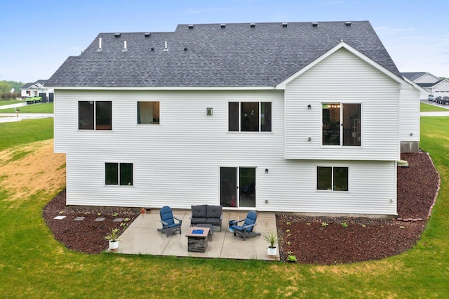 back of property featuring outdoor lounge area, a yard, and a patio area