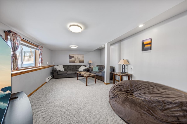 living area with baseboards and carpet