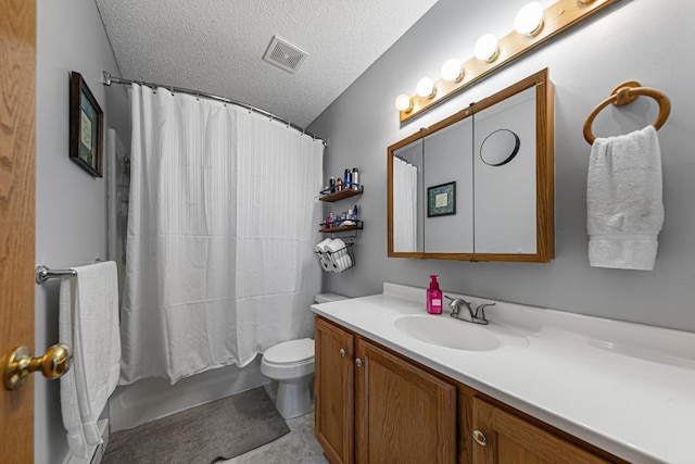 bathroom featuring visible vents, toilet, vanity, shower / tub combo with curtain, and a textured ceiling