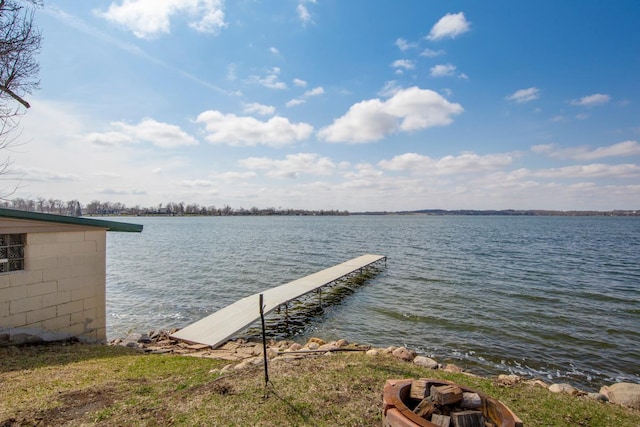 dock area with a water view