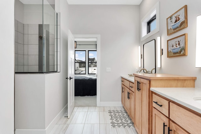 bathroom featuring vanity and a shower