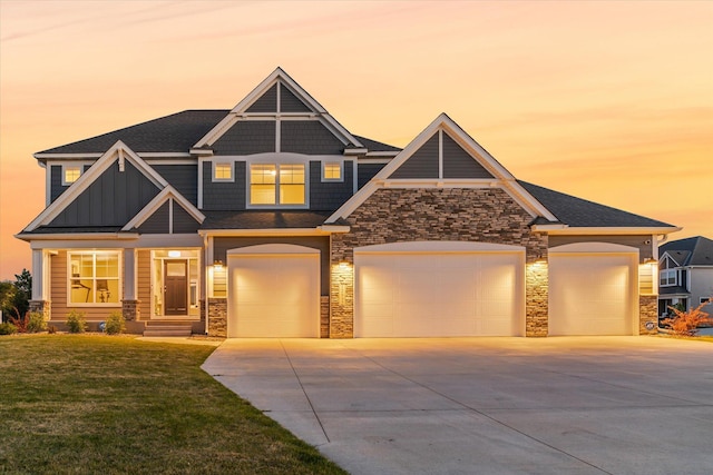 craftsman-style house with a lawn