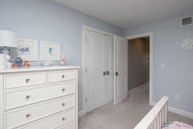 992 Southwell Enclave NE, Byron, MN 55920 - bedroom featuring baseboards, visible vents, a closet, and light colored carpet