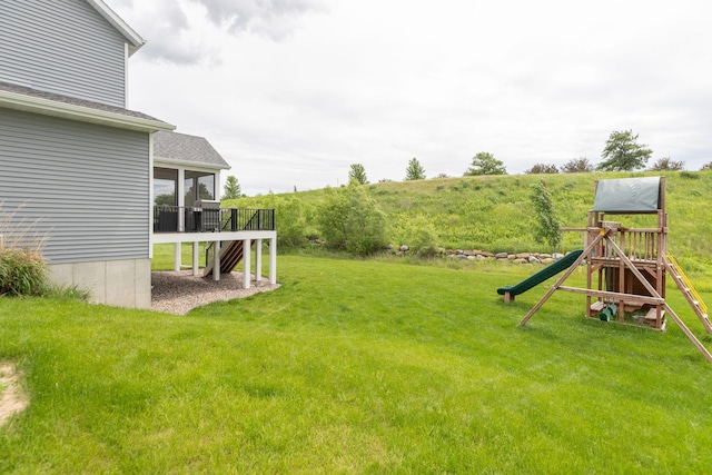 992 Southwell Enclave NE, Byron, MN 55920 - view of yard with a sunroom and a playground
