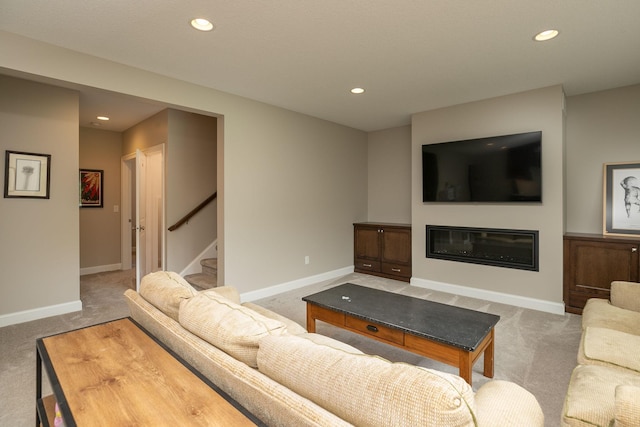 992 Southwell Enclave NE, Byron, MN 55920 - living room featuring stairs, carpet floors, and recessed lighting